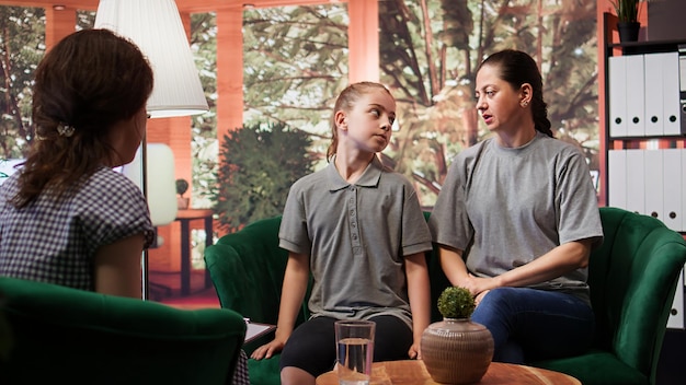psychologist-facilitates-family-therapy-session-emotional-management_482257-108015.jpg